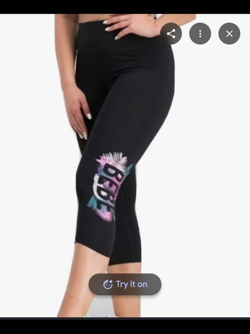 Bebe Nwot Black Cropped Leggings with Pastel Graphic